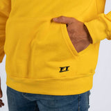 Embroidered FT in black on the pocket of the hoodie